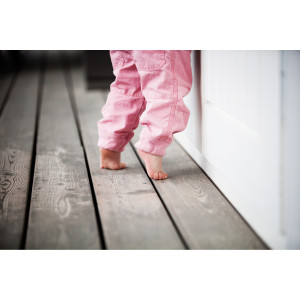 baby walking on tip-toes