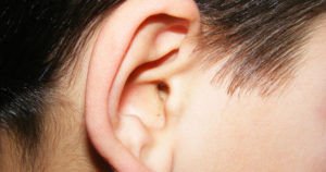 glue ear photo of ear close up