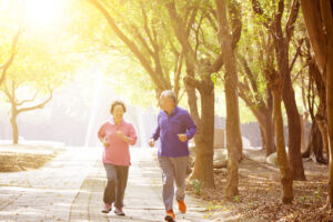 mature couple safely exercising